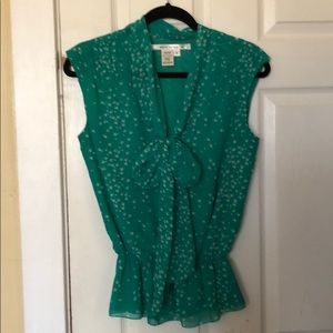 Green/teal sleeveless blouse